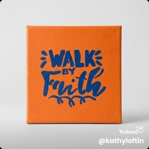 Orange Canvas Art with Blue Text